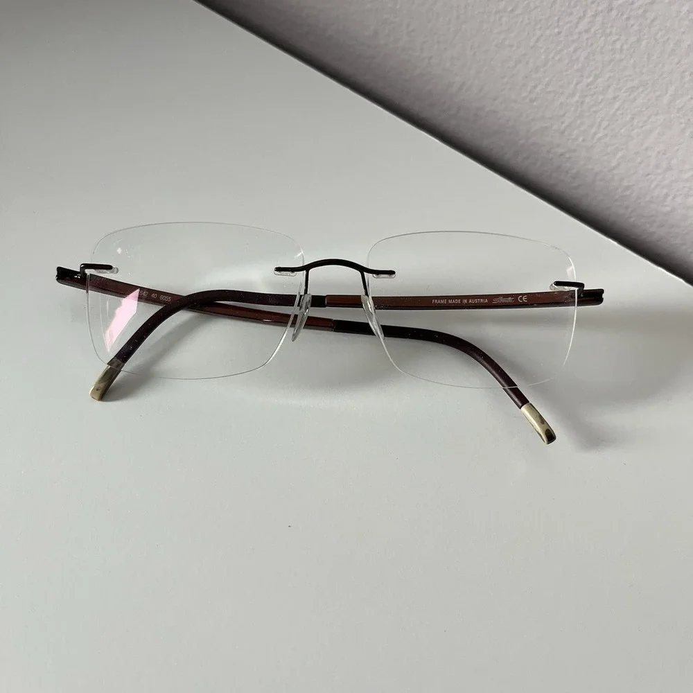 Silhouette Rimless Titanium SPX Frames 7642 40 6055 Brown Burgundy 17x135